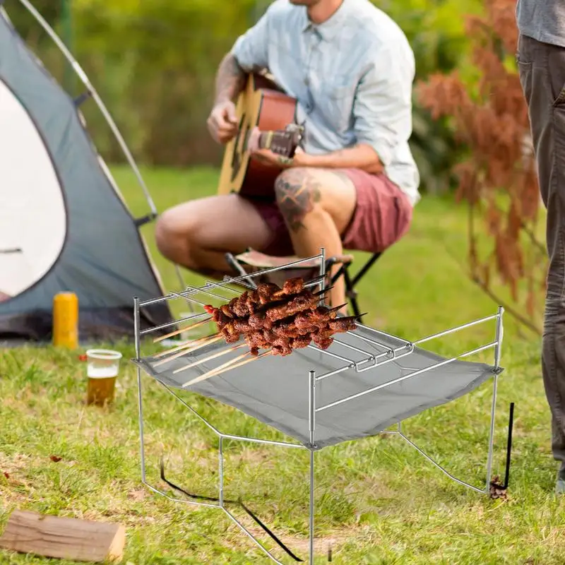 

Portable Mesh Fire Pit With Cooking Grate Burning Table Barbecue Rack Incinerator Burning Wood For BBQ Camping Beach Campfire