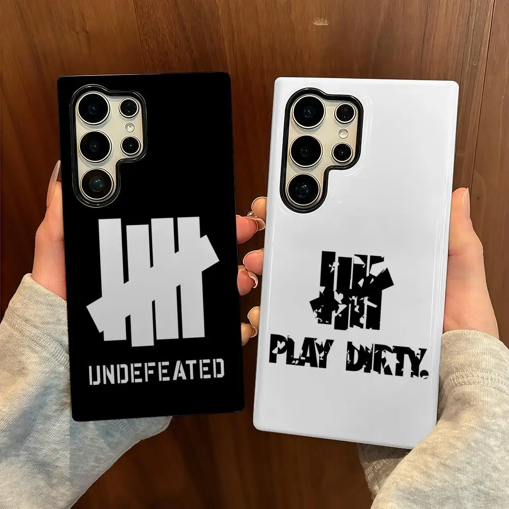 

U-UndefeatedS logo Phone Case For Samsung S25 Film Shell Luxury GalaxyS24Ultra 23plus S22 21 A56 36 26 16 Double layer Cover
