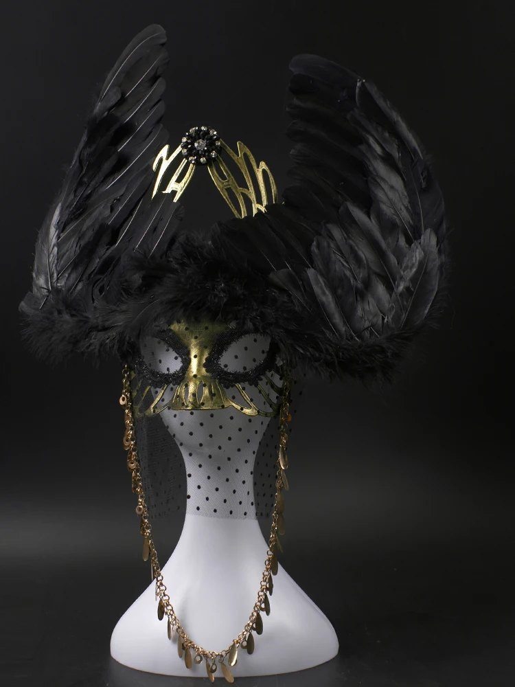 

Black exaggerated large feathered wings female stage mask