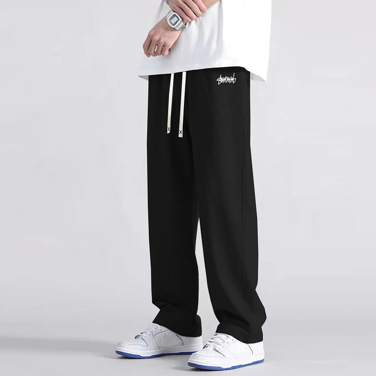 Pantalones para correr de pierna recta de color sólido para hombre, adecuados para deportes casuales como correr, gimnasio y actividades al aire libre.