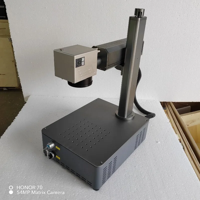 Raycus 20W or 30W mini fiber laser marking machine with 7110 glavo head have a good price to door