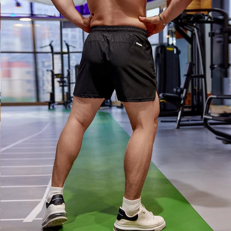 New Summer running shorts Men's sports jogging fitness shorts Gym training Quick-drying sports Zipper pocket male Cropped pants