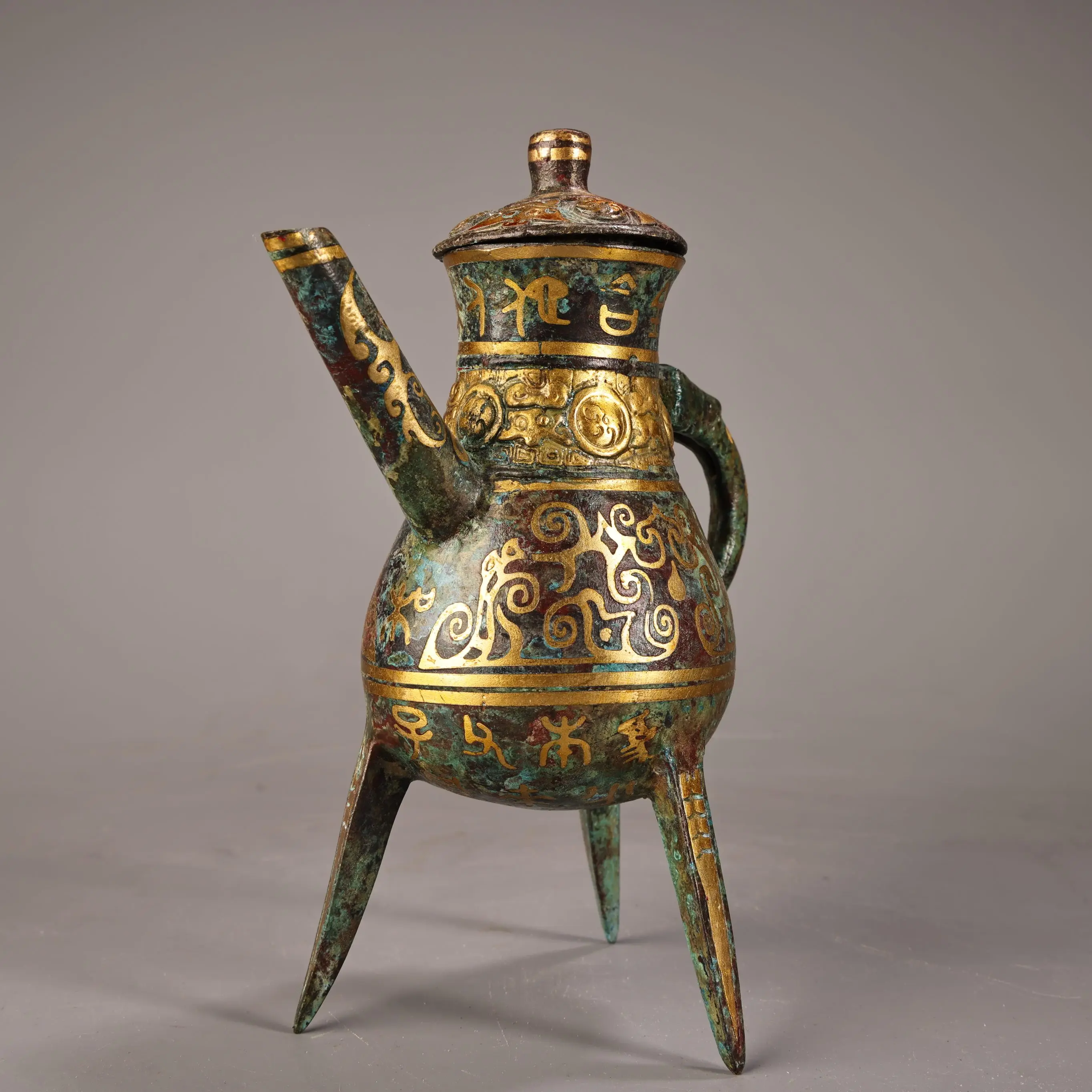 Old Nepalese folk Old Bronze Ware Gilded Inscription Oracle Bone Script Pattern Three legged Teapot Flagon Kettle Ornaments
