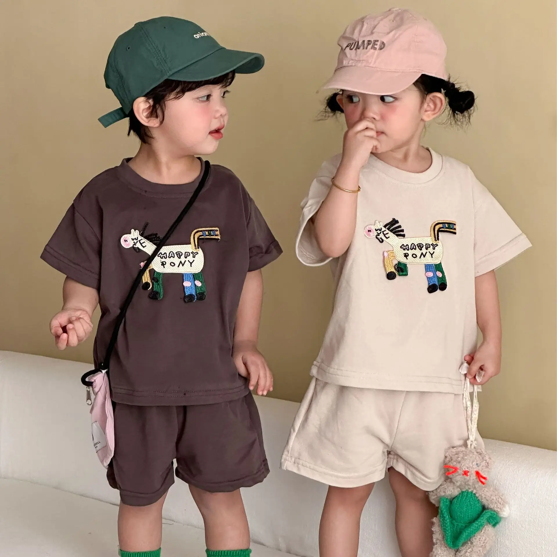 

2026 Summer New Children Short Sleeve Clothes Set Boys Girls Cartoon Print T Shirts + Shorts 2pcs Suit Kids Loose Sports Outfits