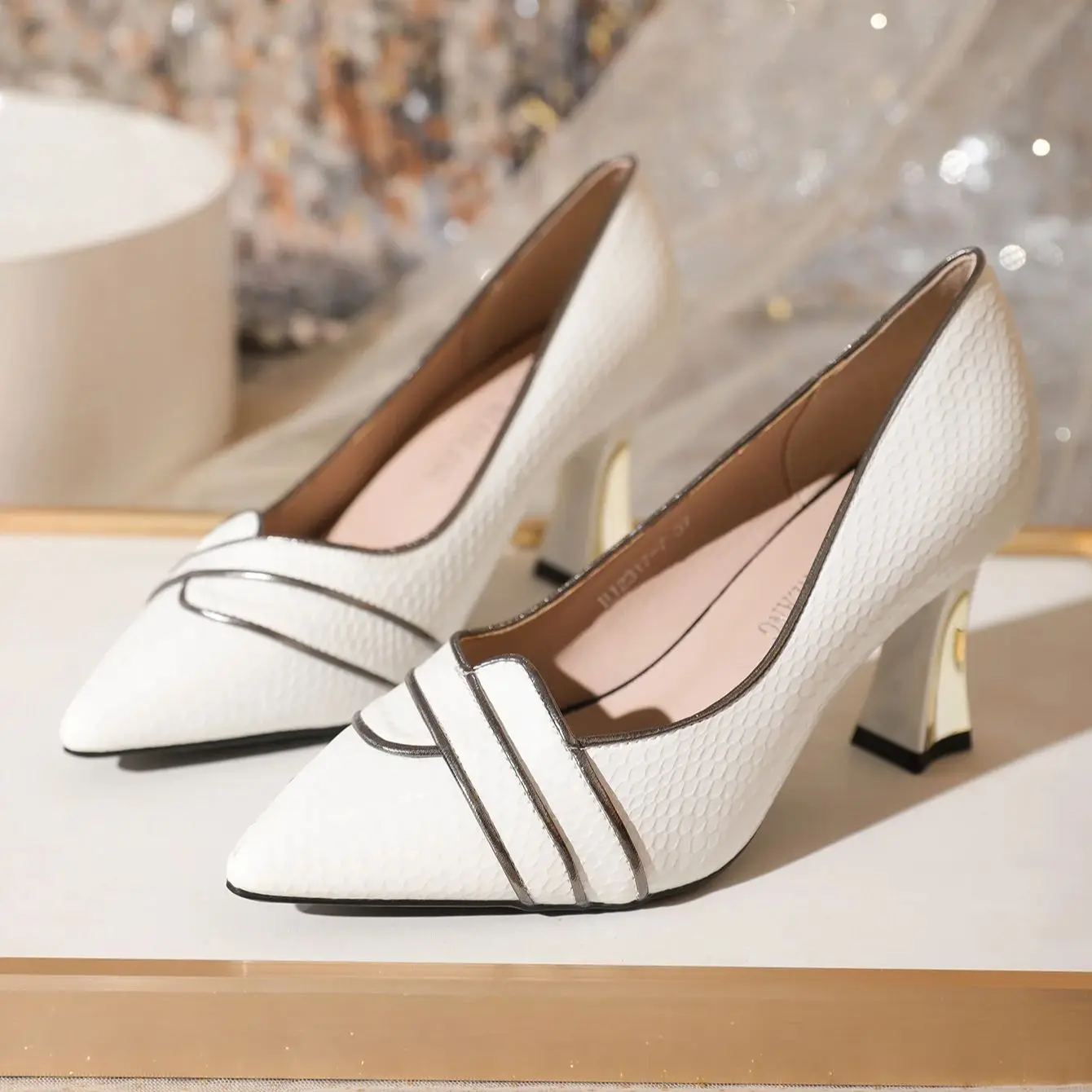 Fashion high-heeled shallow-mouthed single shoe with pointed stitching