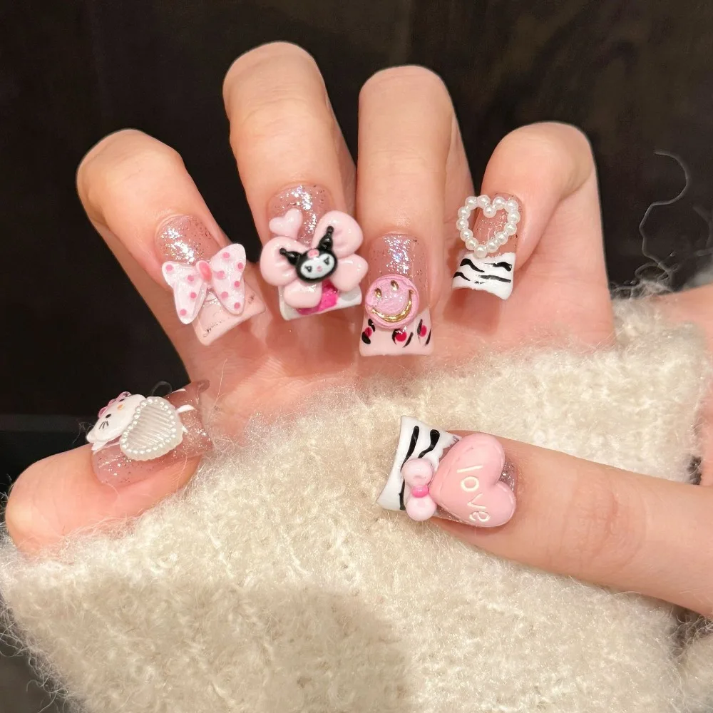 Charming Pink Nail Art with Hello Kitty Adorable Designs Featuring Cute Kitty Sparkling Pearls Sweet Motifs Stylish Manicure