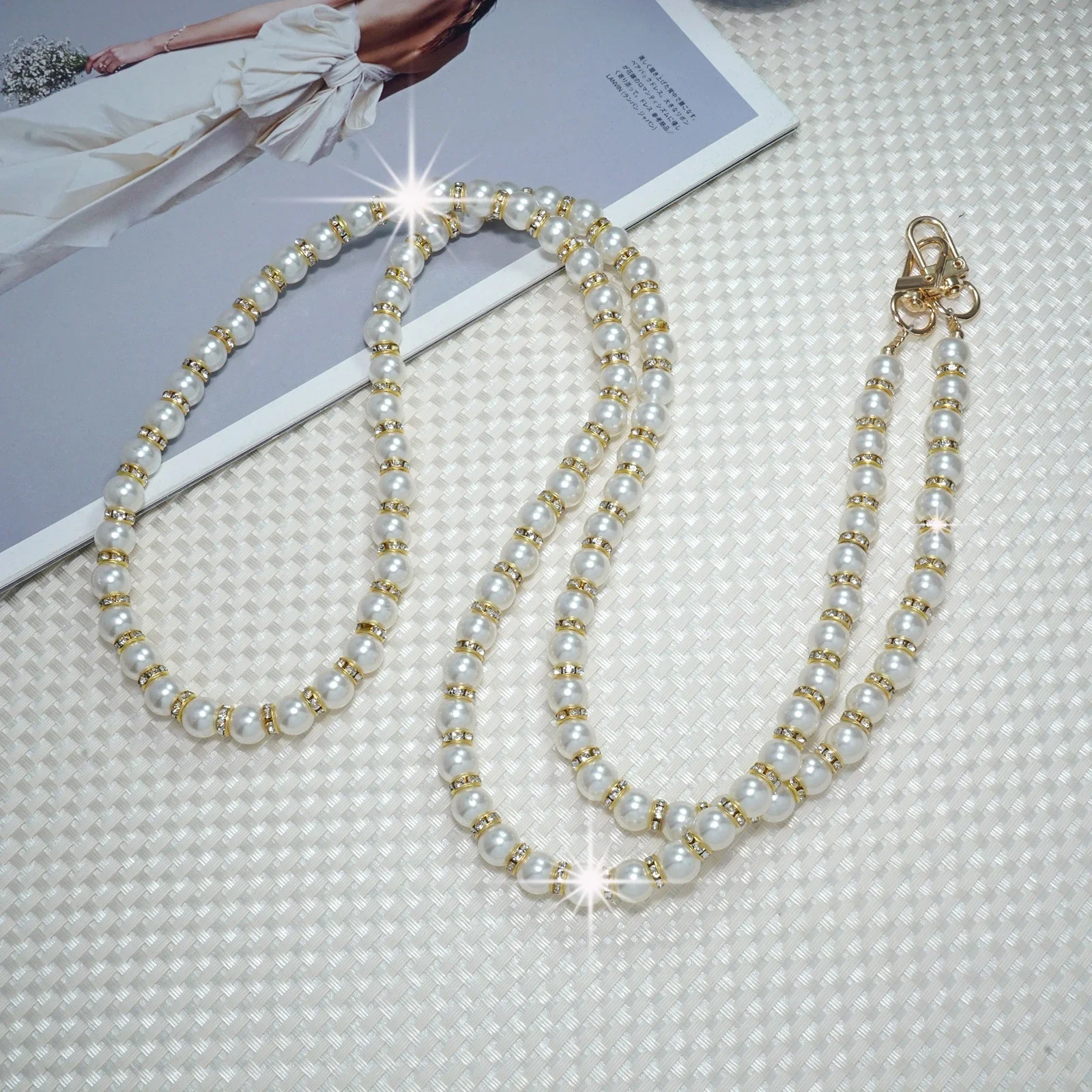 

Pearl crossbody lanyard rope bag mobile phone strap hanging chain high-end anti loss imitation pearl hanging rope phone charm