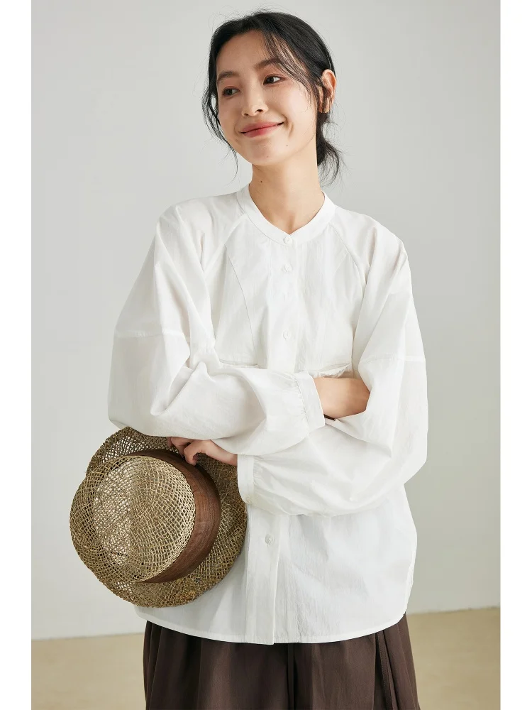 

Faionable round Ne Long Sve Bubble Sve irt Women's High-End Design Sense Spring Summer New Sle Simple Chic Blouse