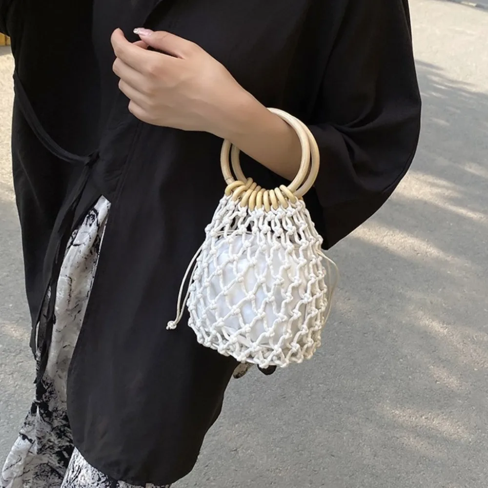 

Portable Weaving Straw Woven Handbag Elegant Korean Style Bucket Tote Bag Solid Color Niche Design Woven Beach Bag Beach