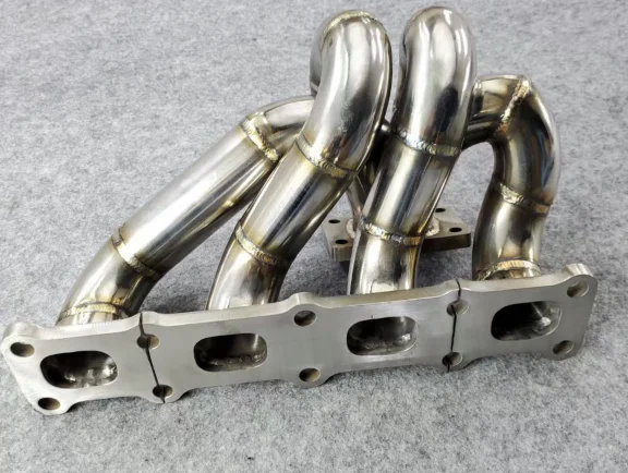 Retrofitted stainless steel plantain, turbo head coke exhaust manifold suitable for