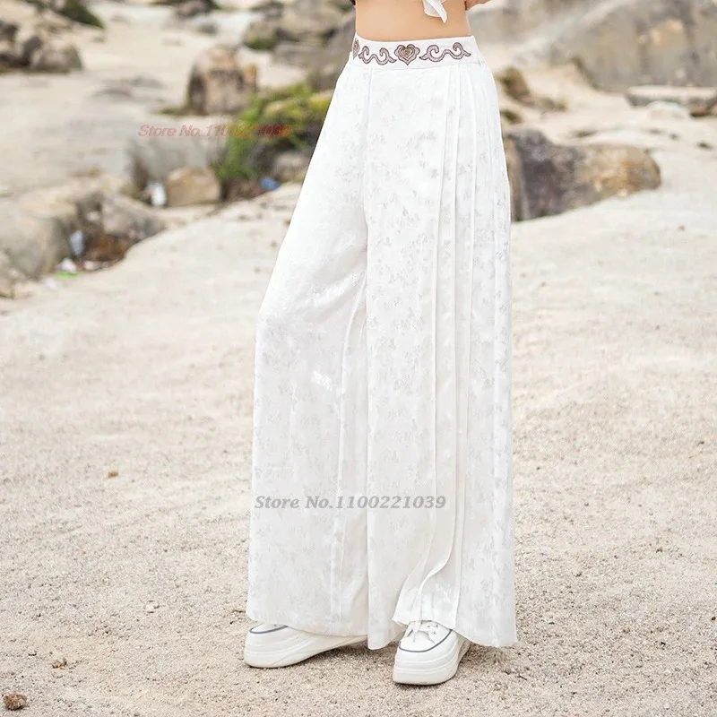 2025 chinois vintage taille élastique pantalon national satin jacquard folk pantalon femmes traditionnel jambe large pantalon ethnique pantalon