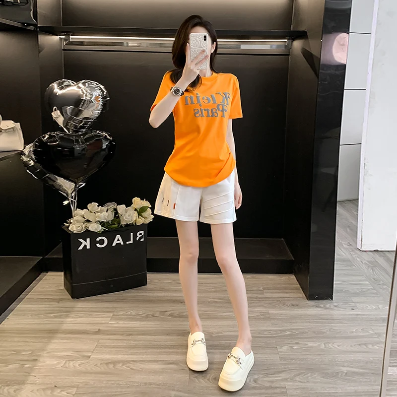 Korean version of 2024summer new loose orange short sleeved top sports set women's fashionable age reducing shorts two-piece set