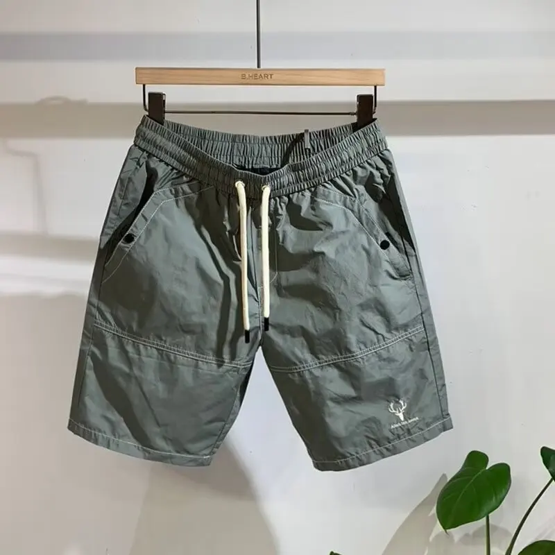 2024 Men\'s Sports Shorts Summer Graphic Sweatpants High Street Fashion Green Shorts High Quality Beach Quick Drying Shorts New