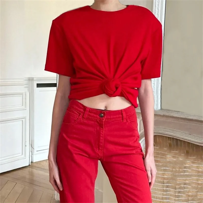 

Женская футболка: Новая эластичная укороченная модель с коротким рукавом на весну 2026 года, с подплечниками, приталенная, с круглым вырезом, из смесового хлопка.