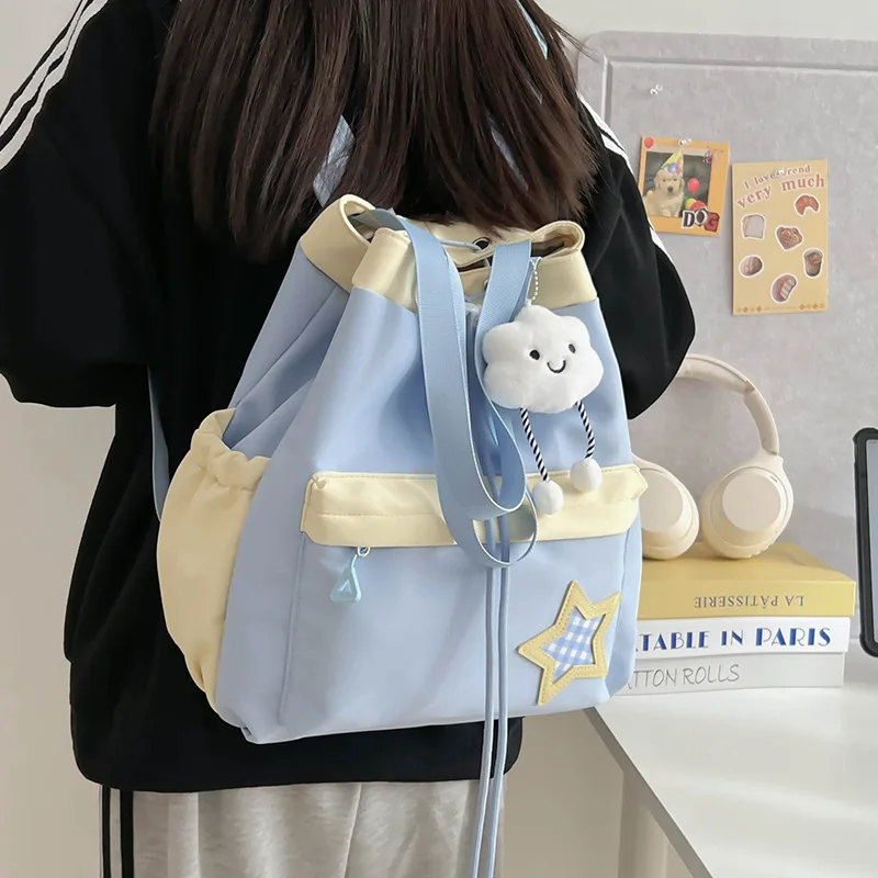 Cute and color-blocked schoolbag for female students, fashionable and casual hand-held backpack, cute and adorable