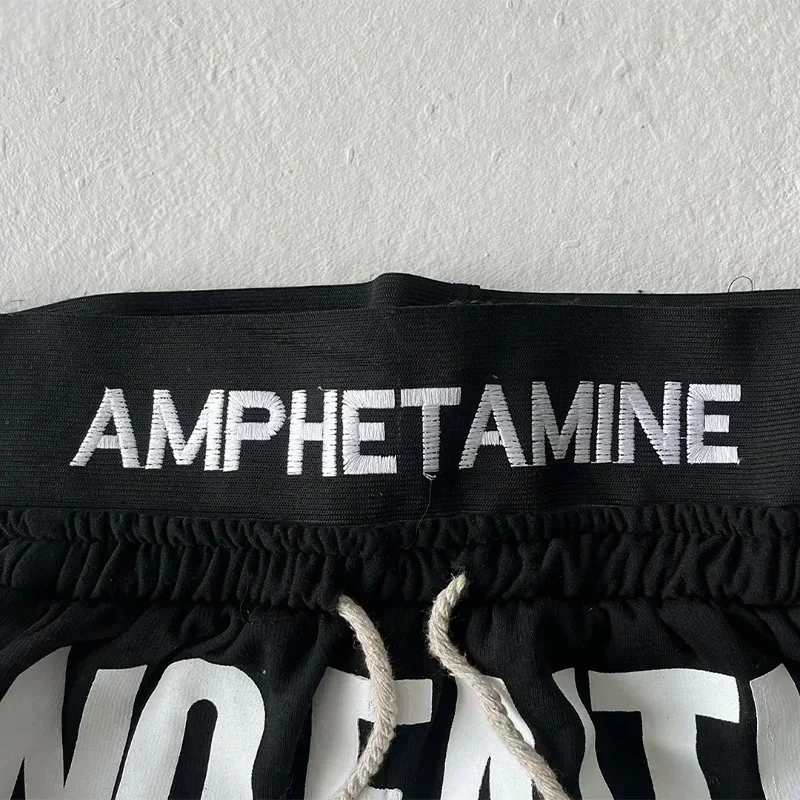 

Y2K Loose Hip Hop Pants Letter Printing Side Stripes Casual Drawstring Sweatpants Trend Men Women Comfortable Fashion Streetwear