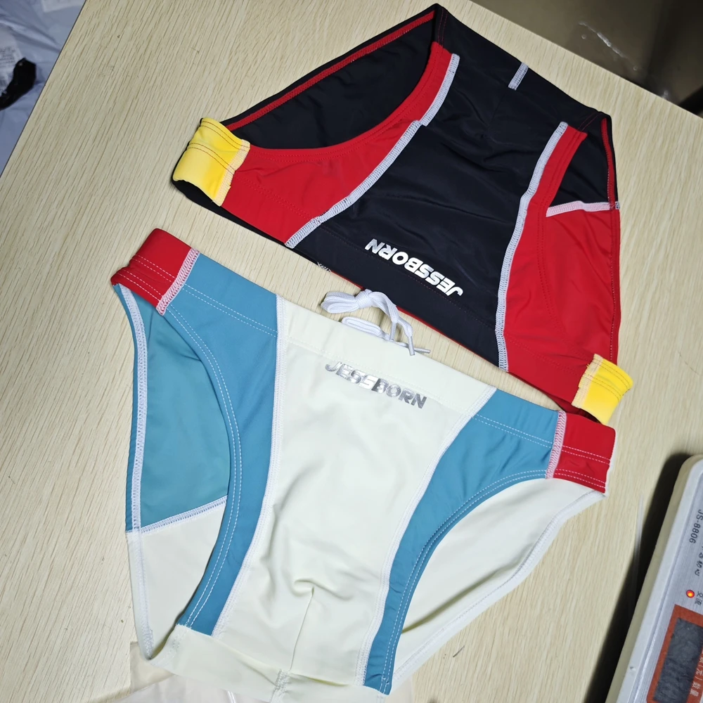 ..style swimming trunks men's nylon color matching hot spring swimsuit European and American cup anti-light swimsuit10118