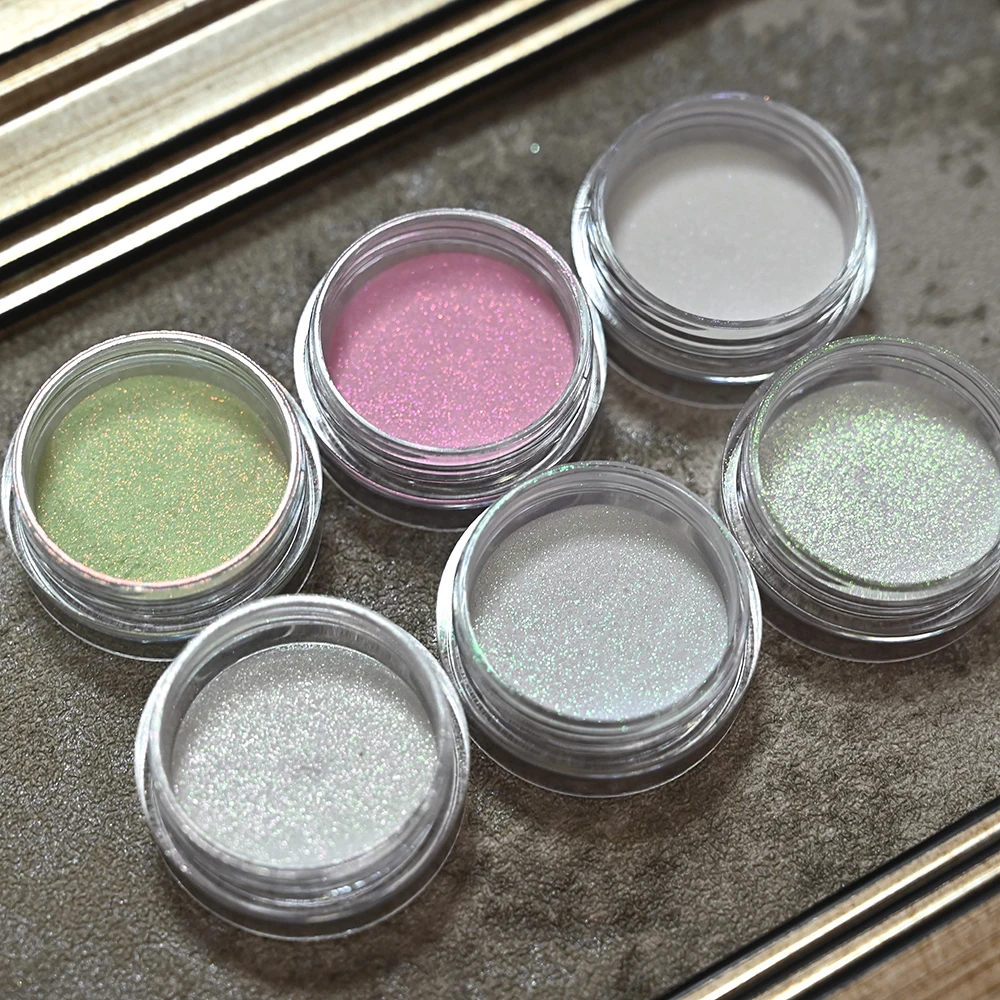 1 scatola (0,2 g) Aurora Chrome Nail Powder Holo effetto specchio Neon Sirena Pigmento Polvere per smalto gel Unghie Decorazioni Shell Powder