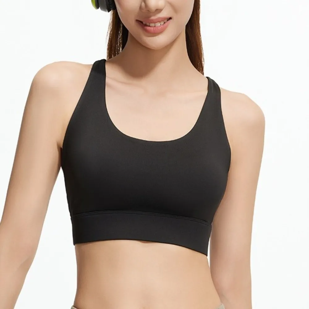 เสื้อชั้นในกีฬาโยคะแบบตาข่ายไขว้สำหรับผู้หญิง ป้องกันการกระแทก ลดแรงสั่นสะเทือน ชุดชั้นในโยคะ บราในตัวเสริมฟองน้ำแบบไม่มีตะเข็บ เสื้อกล้ามออกกำลังกาย