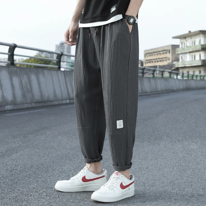 

New Spring and Summer Men's Solid High Waist Elastic Loose Plus Size Thin Harem Pants Fashion Casual Commuter Trousers