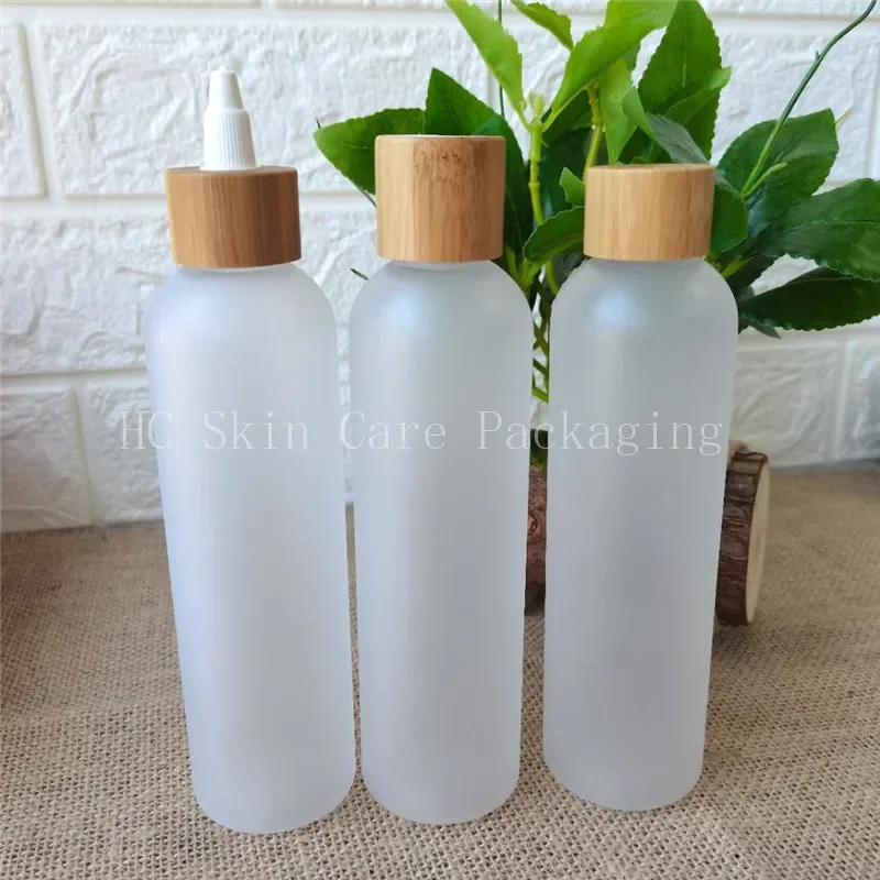 

Portable Travel Frosted Plastic Bottles with Bamboo Lid Plastic Toner Water Cap Bottle Shampoo and Conditioner Refillable Bottle