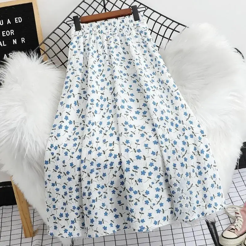 تنانير شيفون مطبوعة رائعة للسيدات صيفية متوسطة الطول تنورة طويلة صغيرة منقوشة بالزهور عالية الخصر فوق الركبة