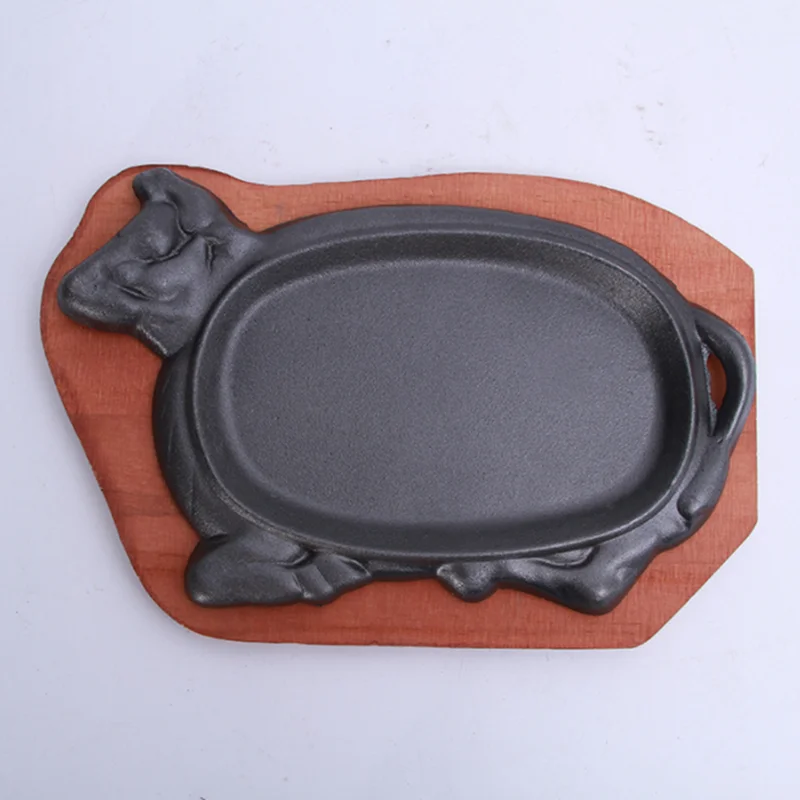 Gran oferta, plancha para carne de hierro fundido con Base de madera, sartén para carne (en forma de vaca)