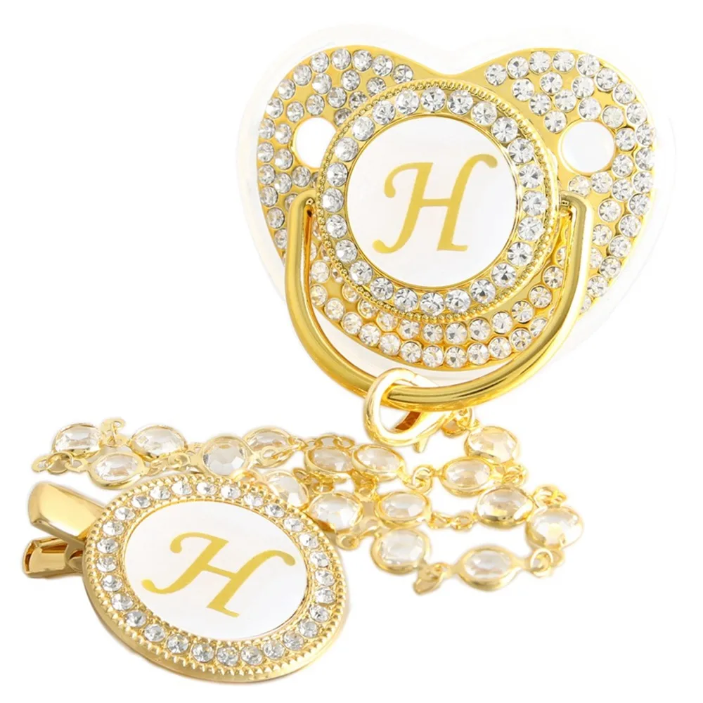 Goldener Baby-Schnuller mit 26 Anfangsbuchstaben und Diamantkettenclip