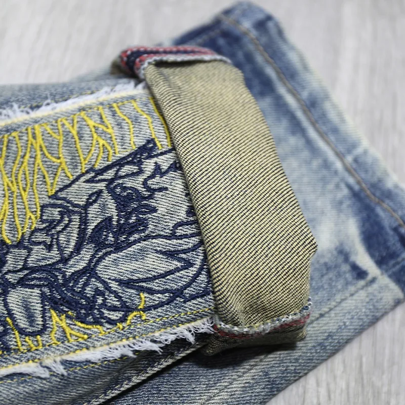 男性、ヒップホップファッション、ヴィンテージデザイナーのデニムパンツ、男性のパンクロックy2kパンツ、青のための折りたたまれたストリートプリントジーンズ