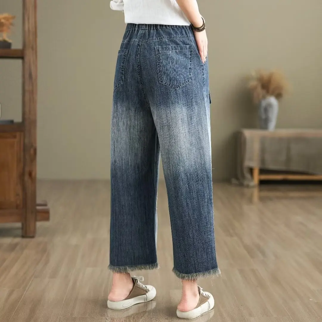 Aricaca กางเกงเอวสูงสำหรับผู้หญิงกางเกงขาบานดีไซน์ปักลาย M-2XL กางเกงยีนส์แฟชั่น