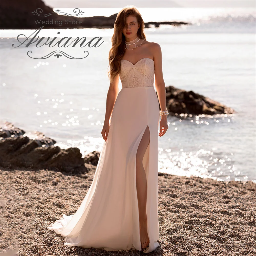 Aviana Maßgeschneidertes Brautkleid in A-Linie mit herzförmiger Spitze und Stickerei, rückenfrei, Sweep-Zug, hoher Schlitz, modern, trägerlos, ärmellos