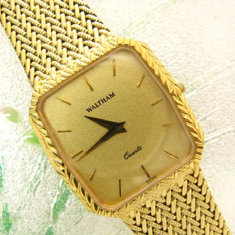 Waltham all inclusive gold  integrated chain quartz Switzerland inventory watch