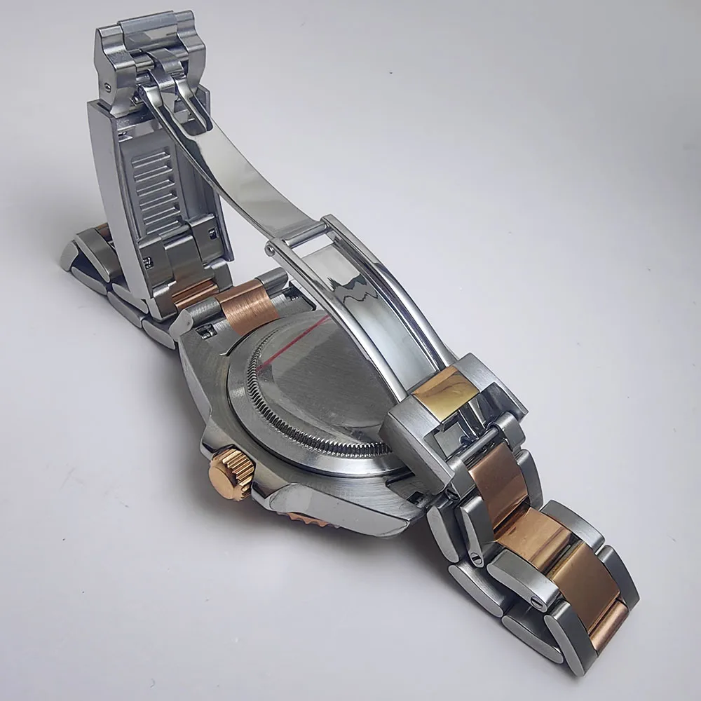 40 مللي متر الفضة والذهب الوردي حاوية من الفولاذ المقاوم للصدأ حزام الياقوت الزجاج الأخضر الإطار الزجاجي القاع مع حركة NH34/35