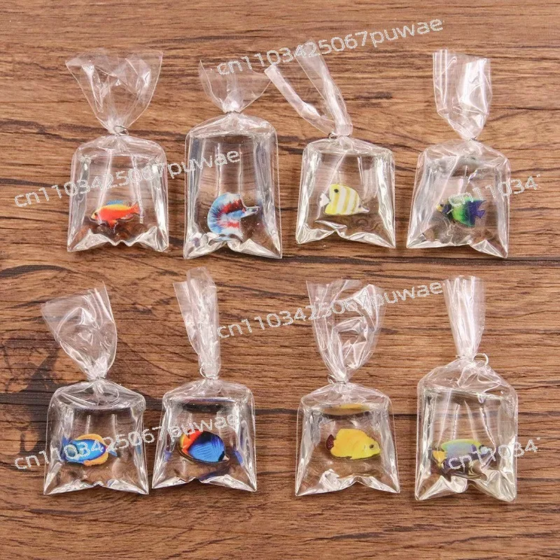 人気のクリエイティブな透明キャンディ金魚キーホルダー、パーソナライズされた樹脂製鯉キーホルダー