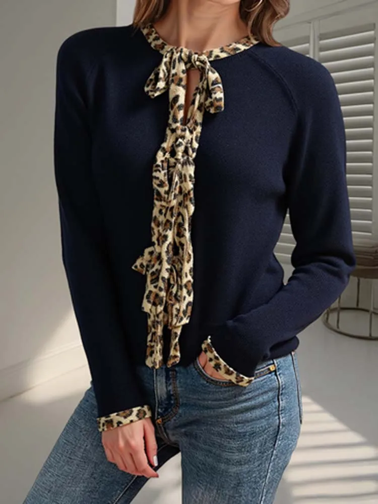 

Технологичный дизайн женского кардигана с черной отделкой, леопардовым принтом, шнуровкой и V-образным вырезом, модный, в ретро-стиле и элегантный.