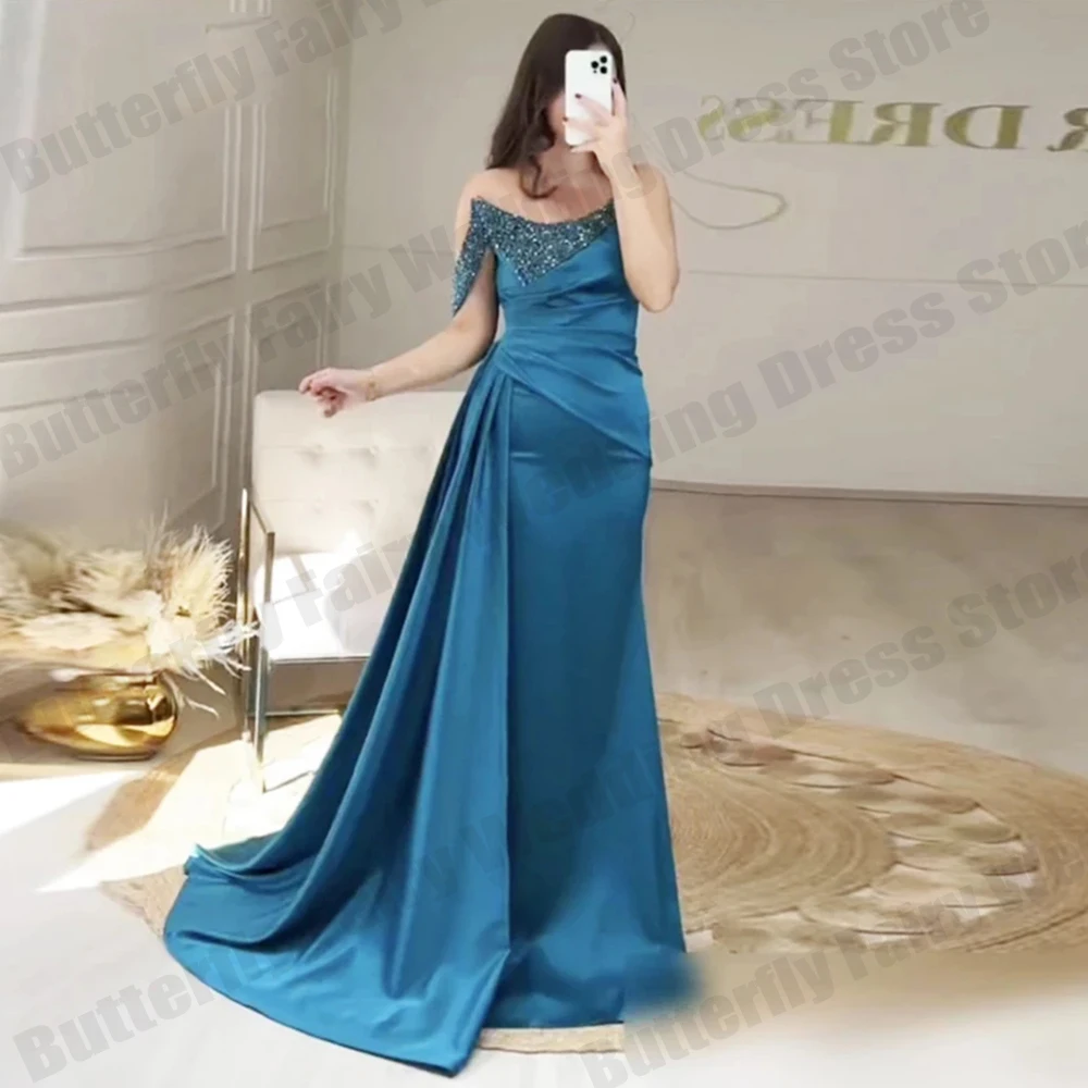 

Fascinating Latest Long Evening Dresses For Women New 2023 Off Shoulder Sleeveless Design Ruched Waist Ribbon Beading Sequined