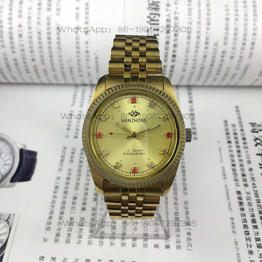 

Hanzhong Watch Factory, Hanzhong brand yellow shell yellow face red diamond manual mechanical watch, diameter 36mm