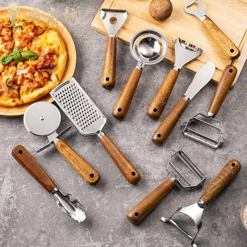 أدوات المطبخ الصلب اليدوية أدوات الطبخ المفيدة مقشرة الخضار فتاحة علب خافق البيض قطاعة البيتزا قطاعة الجبن