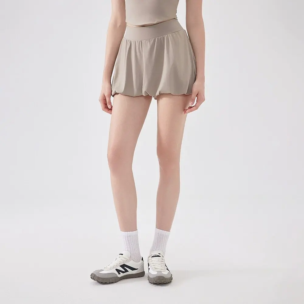 Sommerlicher Tennisrock für Damen in Nude, hohe Taille, Anti-Exposure, atmungsaktiv, mit Taschen, bauschiger Sportrock für Fitness, Laufen und Pilates. – Detail 11