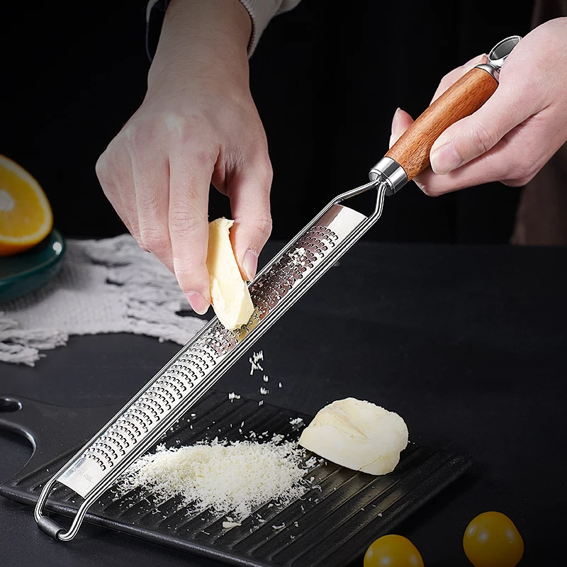 

Ultra Sharp Uniform Grating Hole Hand Protect Cheese Grater LFGB Certificate Fruit Vegetable Crusher Garlic Mill Kitchen Tool