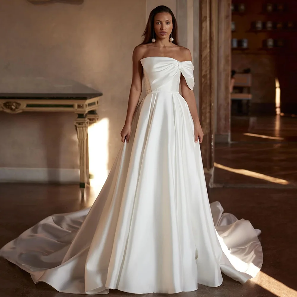 فستان زفاف من الساتان Vestido De Noiva مخصص بدون حمالات مع فيونكة مطوي وسحاب خلفي على شكل حرف A ذيل محكمة فستان زفاف نسائي