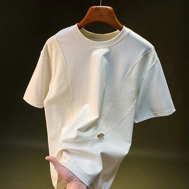 New summer 2025 spliced short sleeved T-shirt for men with a niche design