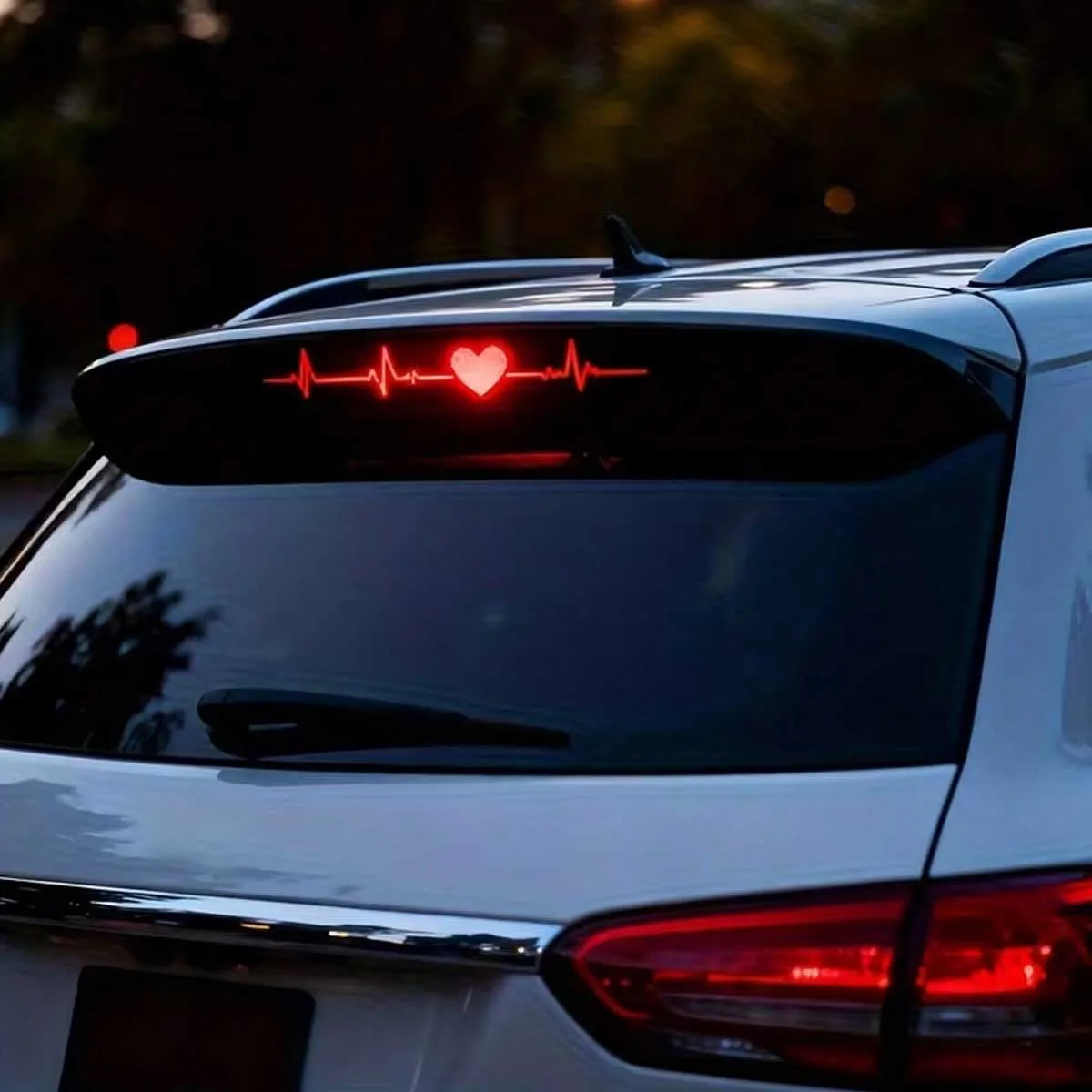 High-Hanging Brake Light Stickers and 3D Carbon Fiber Matte Patterns Add Eye-Catching Safety Signs to the Vehicle