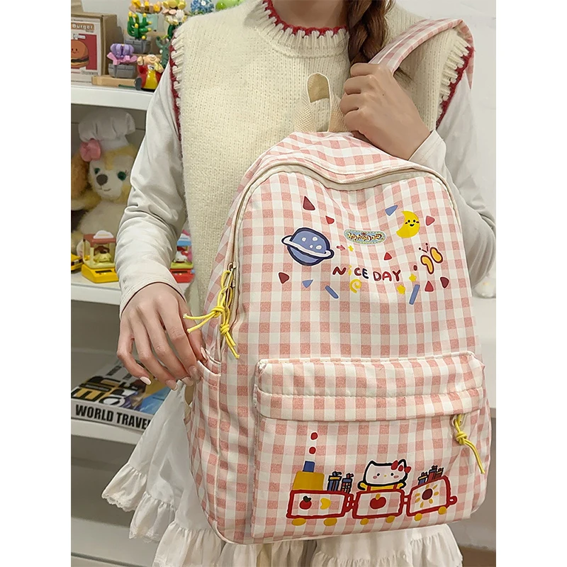 

Schoolbag for girls, middle and high school students, cute large capacity cartoon light backpack, portable sweet