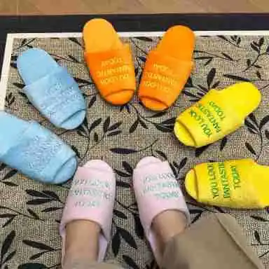 

Fashion Positive Energy Silent Slippers Embroidered Couple Slippers Velvet Home Cotton Drag Korean Disposable Slippers Wholesale
