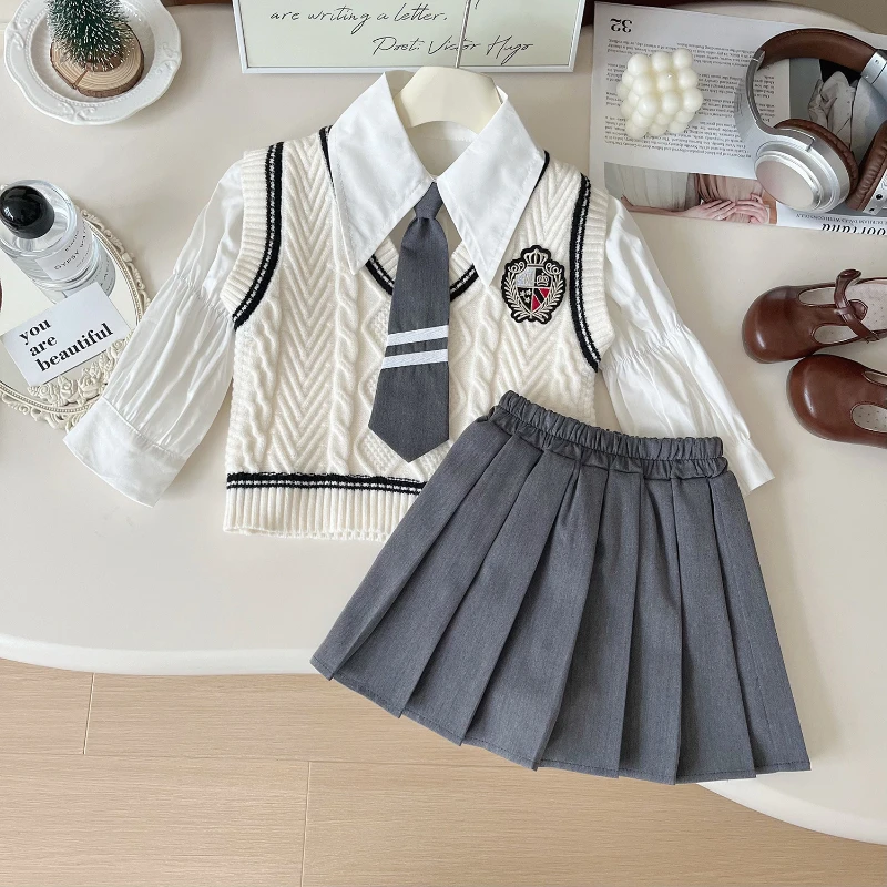 

Girls New Preppy Suit Autumn Girls Jk Stylish Sweater Vest + Solid Color Shirt + Pleated Skirt Three-piece Set 2-7 Yrs