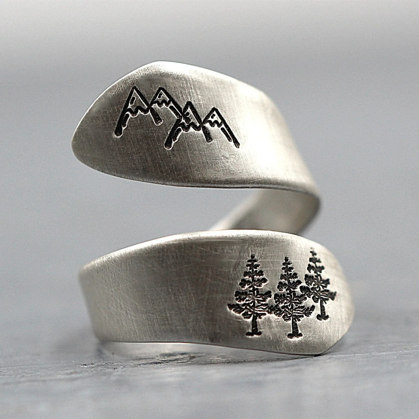 Cross-border new hand-drawn mountain peak green tree forest winding ring