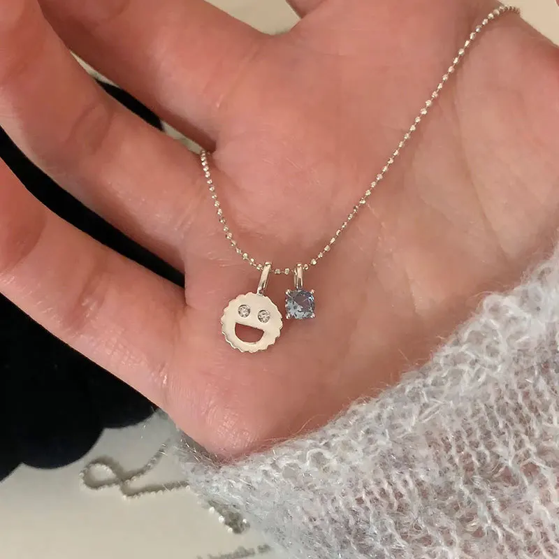 Minar Cute Lovely Blue Rhinestone Hollow Metallic Smile Face Pendant Necklaces for Women Silver Plated Copper Beads Chain Choker