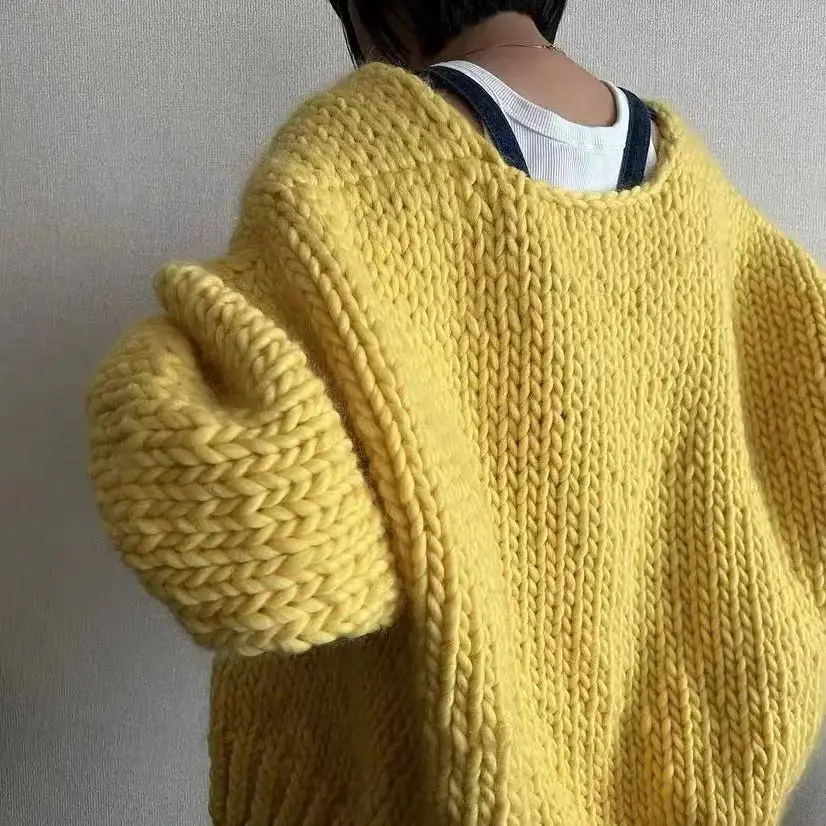 V-neck women\'s cardigan wool sweater with large yellow bubble sleeves, comfortable and soft mohair hand woven autumn new style