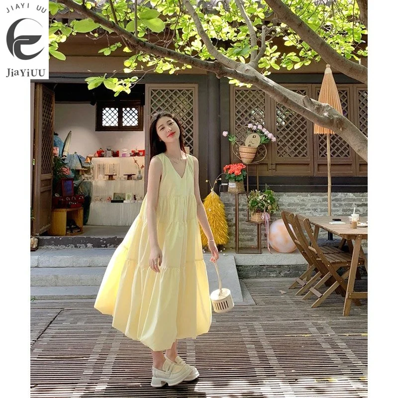 French Gentle Style Sweet Yellow Sleeveless Dress 2024 New High-end V-neck Large Hem Mid Length Skirt Trend